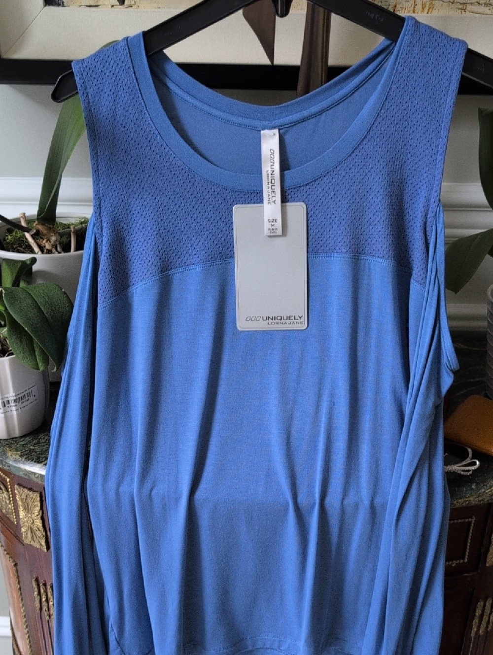 Uniquely Lorna Jane Size Medium Blue Cold Shoulder Top.  NWT